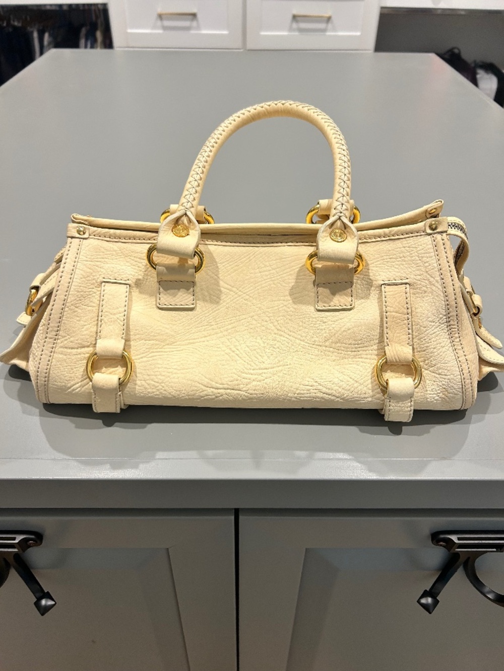 vintage cream celine bag with gold detailing
